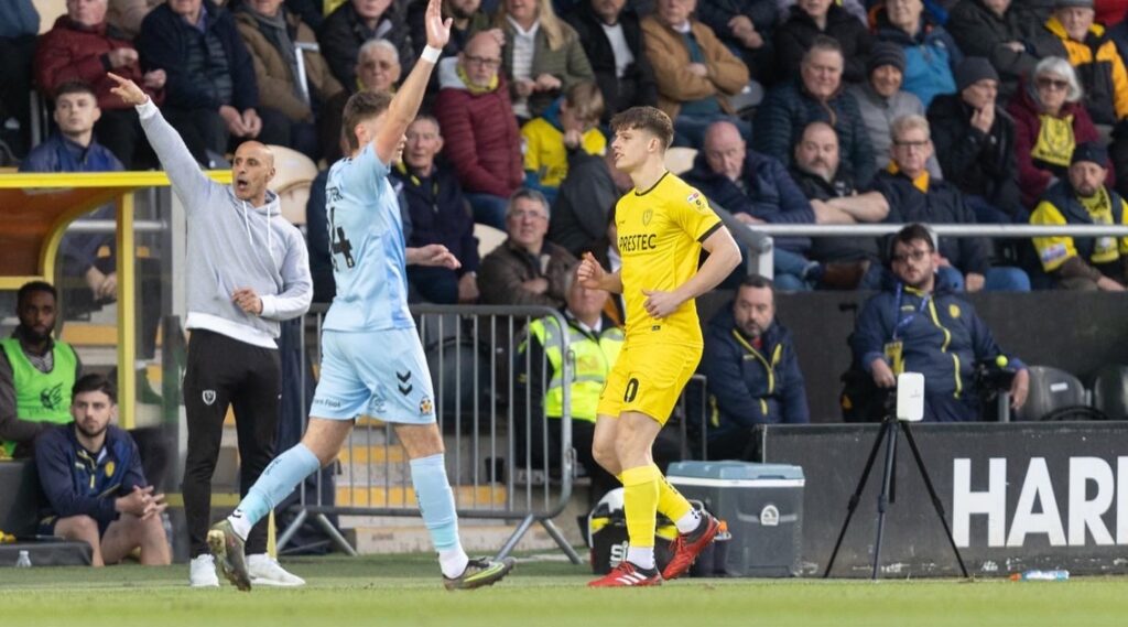 Ben Radcliffe playing football.